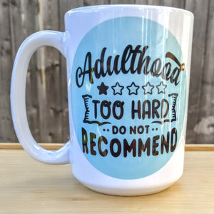 Adulthood Review Mug